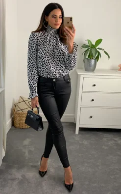 Animal Print Top With Frilled High Neck And Long Sleeve In Black, White And Grey