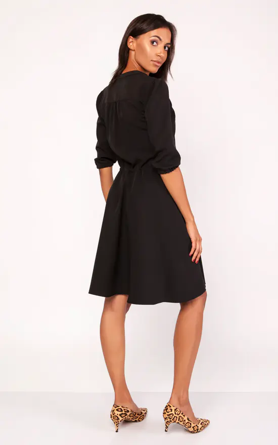 Universal Dress With A Flared Bottom In Black - Image 2